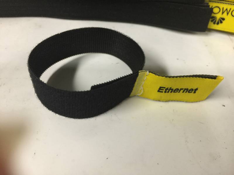 lot 1100 image: Lot of Ethernet comcast velcro straps
