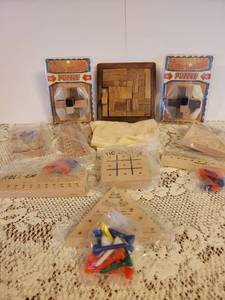 lot 204 image: 10 Wooden Puzzle Games