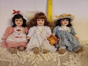 lot 205 image: 3 Porcelain Birthstone Dolls (Feb, June, and Aug)