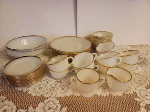 lot 328 image: 45 Piece Fire King Dishes 10 Plates, 10 bowls, 10 Coffee Cups, 10 Saucers, 3 Serving Bowls, and Cream and Sugar Bowls