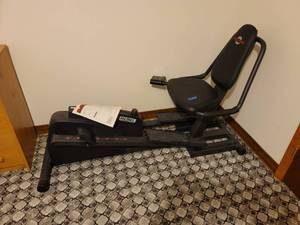lot 434 image: Pro-Form Rebel Recumbent Bike and Elliptical Crosstrainer Located in Basement