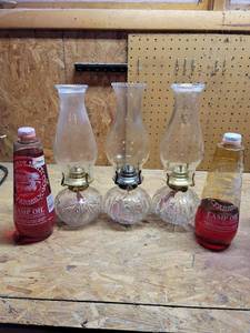 lot 450 image: 3 Vintage Oil Lamps and Lamp Oil