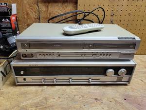 lot 455 image: Magnavox DVDVHS Player (powers on) and Lloyds AMFM Stereo Receiver (No Cord)