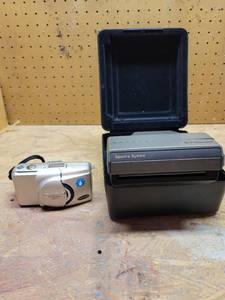 lot 456 image: Olympus 35MM Camera, and Polaroid Camera