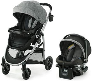 lot 27538 image: Graco Modes Pramette Travel System  Includes Baby Stroller with True Bassinet Mode, Reversible Seat, One Hand Fold, Extra Storage, Child Tray and SnugRide 35 Infant Car Seat, Ellington
