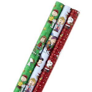 lot 3026 image: Hallmark Christmas Peanuts Wrapping Paper with Cut Lines on Reverse (Pack of 3, 105 sq. ft. total) Snoopy, Charlie Brown, Woodstock