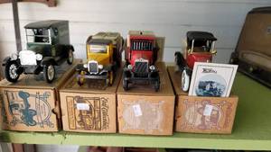 lot 2126 image: Lot of 4 Watkins Collectible Die Cast Coin Collector Trucks