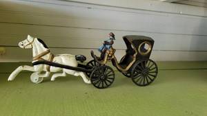 lot 2130 image: Cast Iron Buggie and Horse