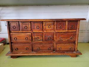 lot 2192 image: Small Wooden Cubbard - 13 Drawers