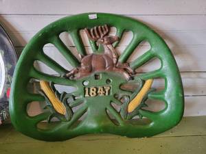 lot 2206 image: 1847 Cast Iron Tractor Seat