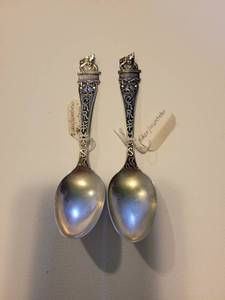 lot 264 image: Pair of Sterling Christmas Baker Manchester Spoons