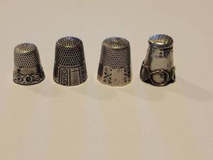 lot 270 image: Lot of 4 Sterling Silver Thimbles