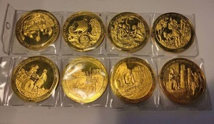lot 289 image: Set of 8 24kt Gold Electro Plated Sterling on Coin - Different Accomplishments of Civilization Coins