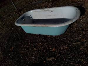 lot 1007 image: Blue Iron Bathtub - Feet Included just not attached