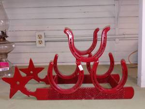 lot 33810 image: Cool Red Wine Rack Made Of Horseshoes And Files