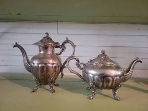 lot 1301 image: Matching Set of Silverplated Tea Pots