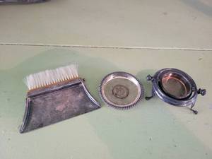 lot 1320 image: Lot of Silver Plated Treasures - Ashtray, Coin Catcher, and Crumb Sweeper