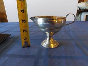 lot 209 image: Weighted Sterling Creamer