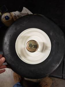 lot 4247 image: 12 Inch Wheel And Tire With Axle