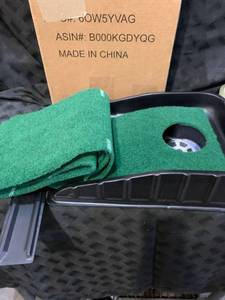 lot 31065 image: Practice Putting Green with Extended Putting Carpet