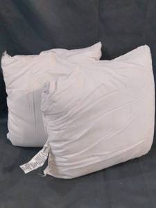 lot 31070 image: 2 WHITE THROW PILLOWS WITHOUT PILLOW CASES
