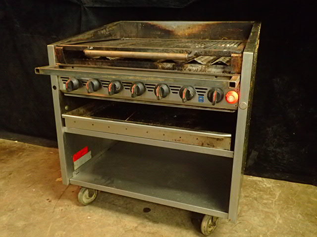 lot 33 image: 36 Natural Gas Char Broiler on Casters with Undershelf Storage