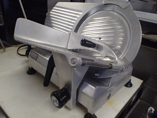 lot 56 image: Omcan 12in Meat Cheese Slicer