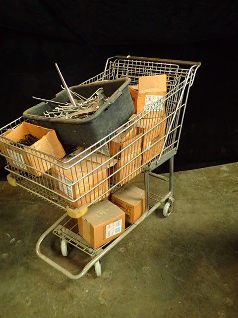 lot 160 image: Grocery Cart of Peg Board Hangers