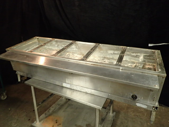 lot 203 image: Five Well Steam Well on an Equipment Stand