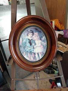 lot 4161 image: oval framed picture of little boy and girl dressed up as blue boy and pinkie 11 and a half inch wide 13 and 12 in tall