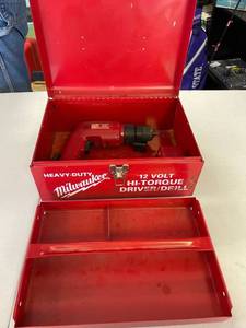 lot 59 image: Milwuakee 12 volt cordless drill & battery, No charger in metal case.