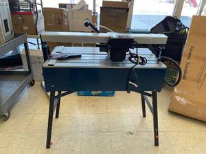 lot 77 image: Chicago Electric 7 bridge tile saw with stand 60608