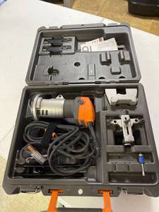 lot 103 image: Ridgid laminate trimms R2400