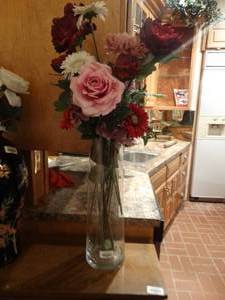 lot 33063 image: Tall decorative glass vase w faux flowers