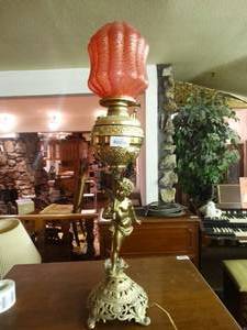 lot 33247 image: Brass cherub electric converted lamp