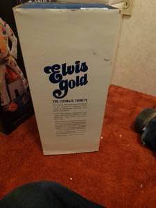 lot 33333 image: Elvis gold McCormick bottle in box