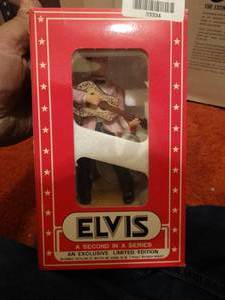 lot 33334 image: Elvis a second in a series McCormick bottle in box