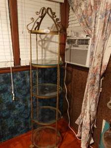 lot 33377 image: Metal round rack w glass shelves