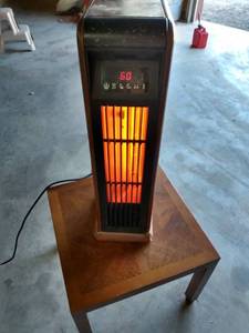 lot 4430 image: portable heater works good 28 12 in tall 7 12-in wide 10-in deep
