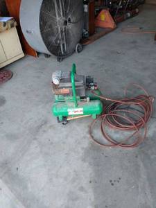 lot 4431 image: interchange brand dual tank air compressor with hose plugged in came on shut off will need serviced