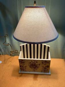 lot 7286 image: Would face lamp with compartment works