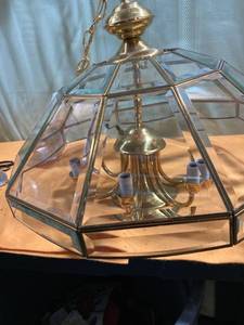 lot 7290 image: beveled glass chandelier 25 inches of crossed 18 inches deep