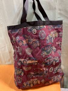 lot 7406 image: Shopping bag 18 inches high 14 crossed