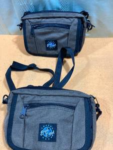 lot 7461 image: Two matching travel gear Eagle Creek little purses