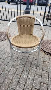 lot 30038 image: Tan Outdoor Wicker Chair W Metal Legs  Base