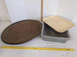 lot 555 image: Serving trays & busboy tote