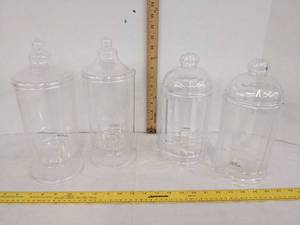 lot 600 image: (4) Plastic Canisters