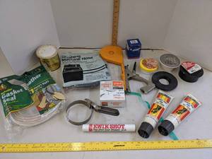 lot 689 image: Washer machine hose, seal, grease, oil filter wrench & more