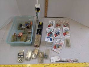 lot 690 image: Charley bolts, fasteners, caulking & matches