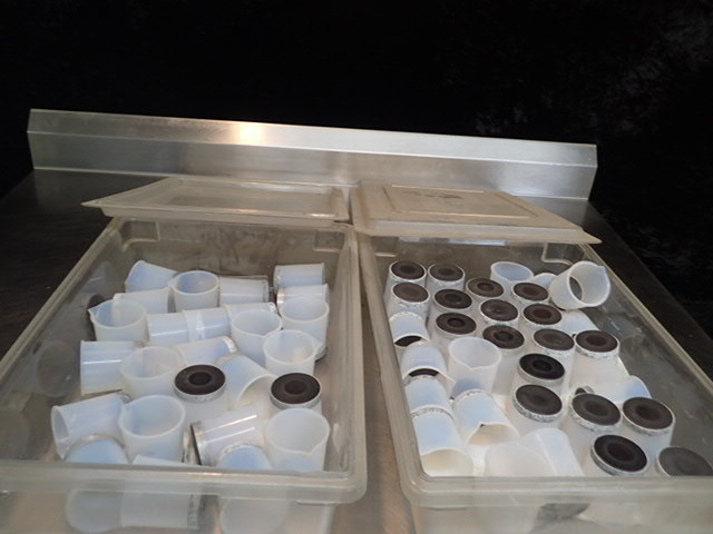 lot 199 image: Large Lot of Plastic Beakers(250ml) with Metal Bottoms